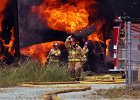 DSC 6493 FreedomTextile FIRE copy  Firefighters with several departments, including Cowpens and Converse, work the scene of a fire at the Freedom Textile Chemicals Co. in Cowpens Monday afternoon, 7-23-07. Many departments assisted with the textile fire which took hours to contain.
